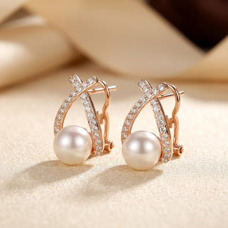 Gold cross pearl stud earrings