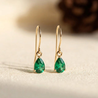 Gold and emerald teardrop earrings