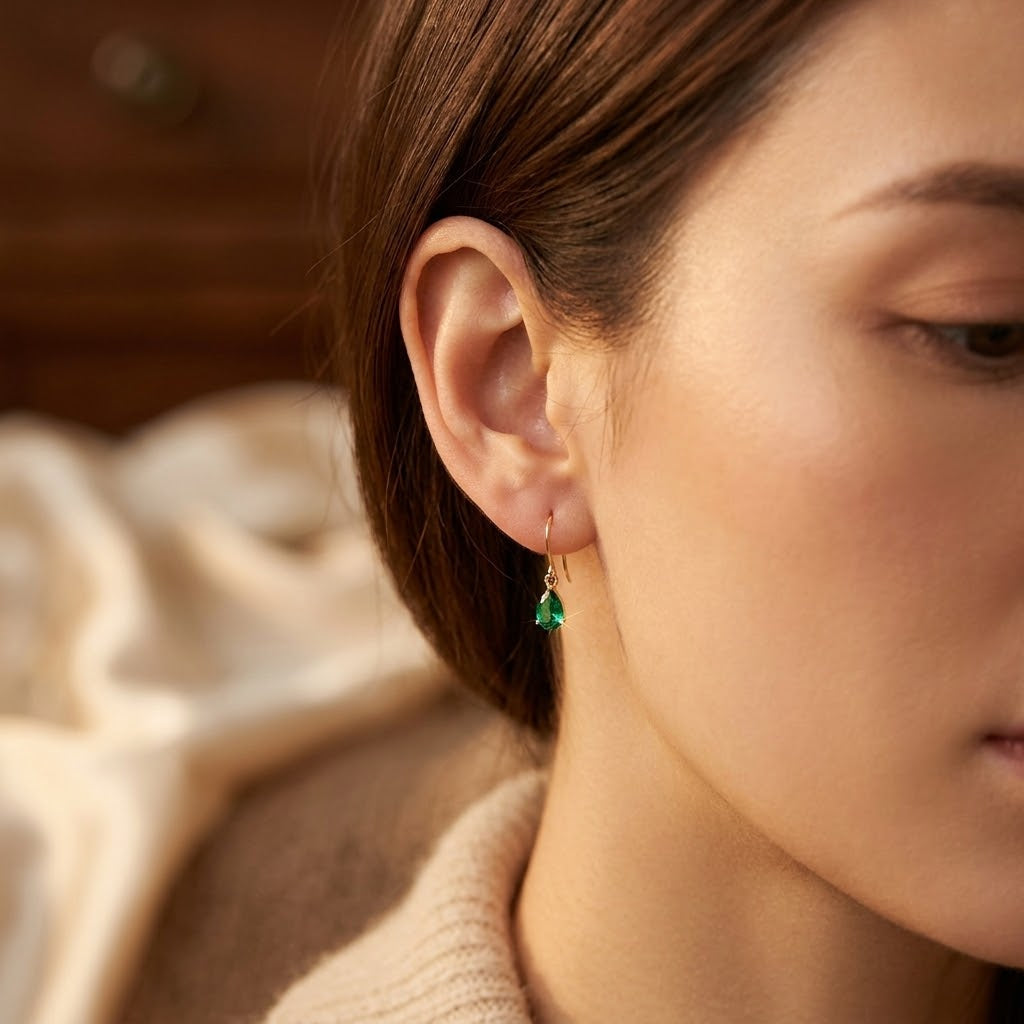 Gold and emerald teardrop earrings